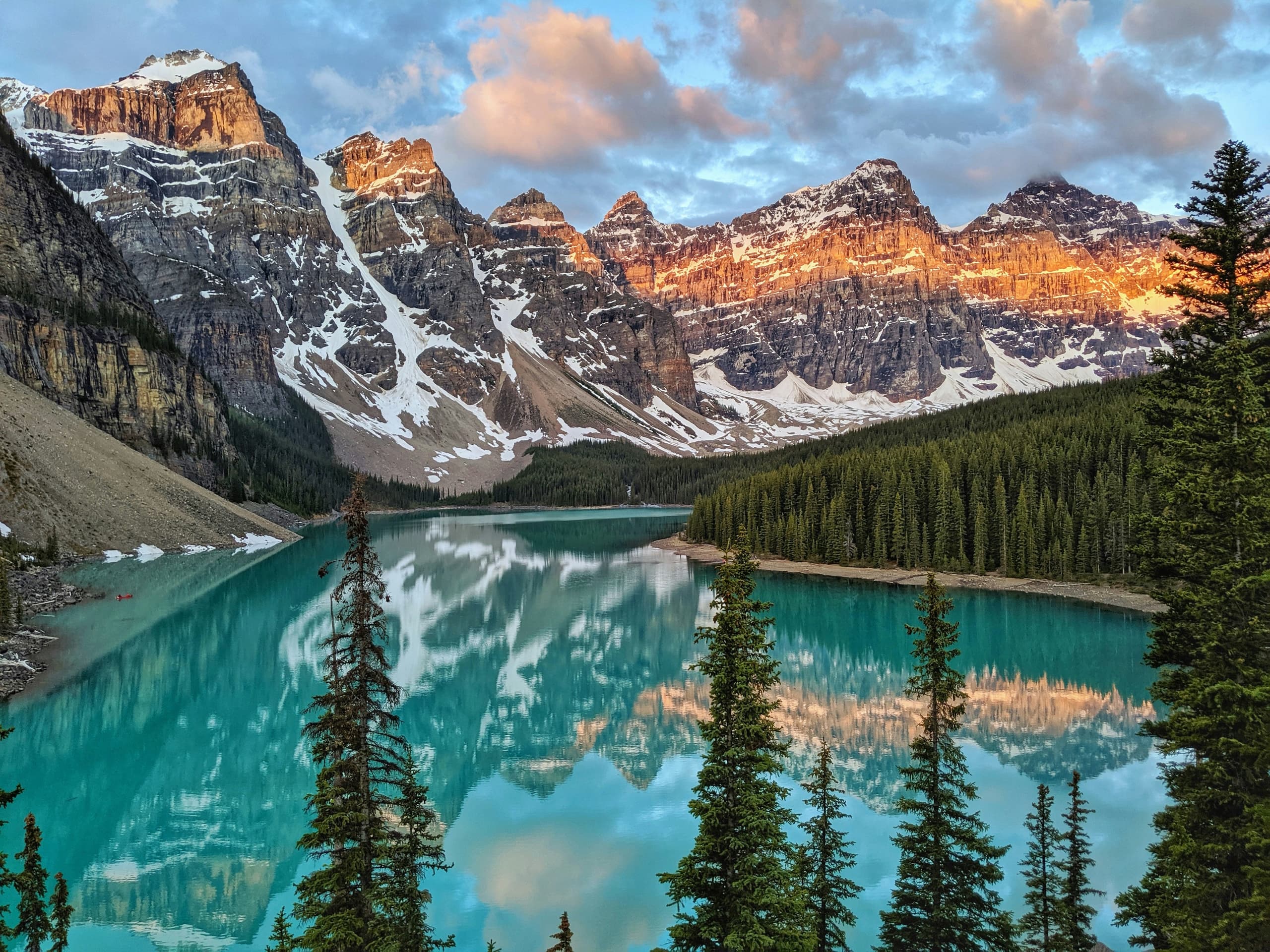 A background image of Banff National Park in Alberta, Canada